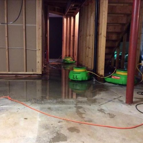 Water Damage Repair 1 Water damage repair technician working in a Frisco, TX home